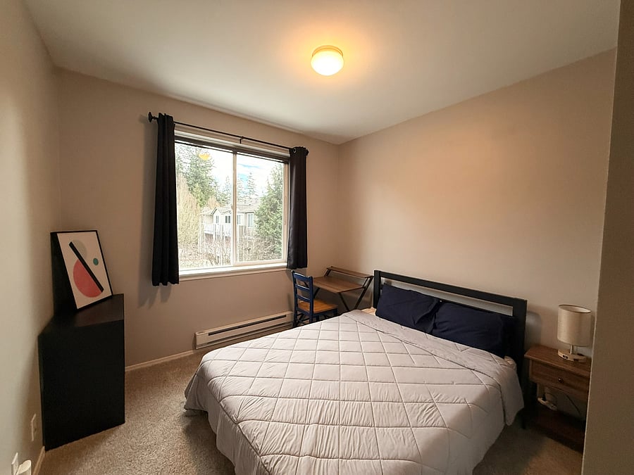 Guest Bedroom includes Queen Bed, additional closet & a small desk to work