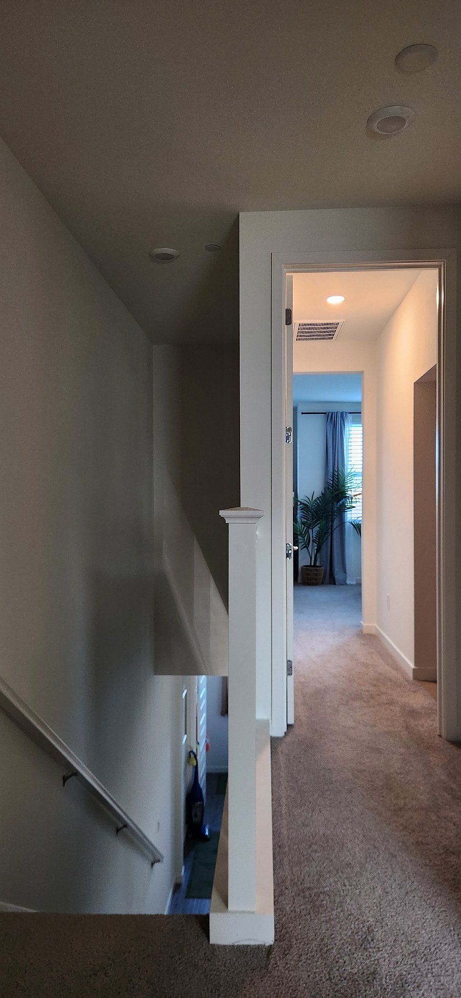 View of the primary suite from the 3rd floor landing.