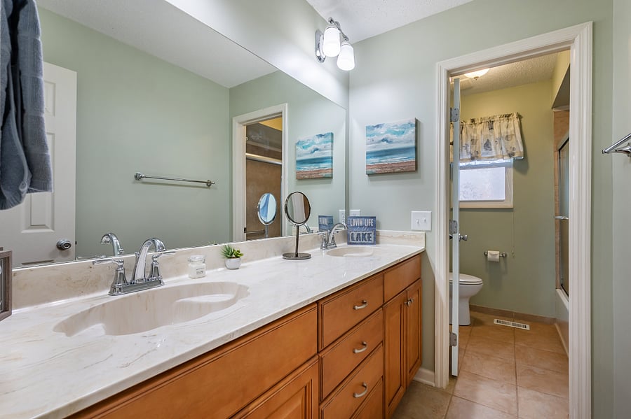 Hall bath includes tub with shower