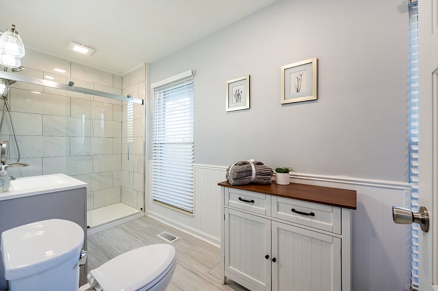 Bright bathroom with walk in shower