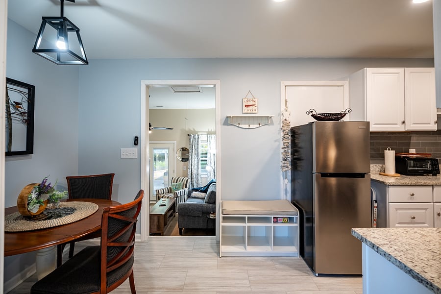 Bench in kitchen drop zone can be used at the table for more seating when needed!