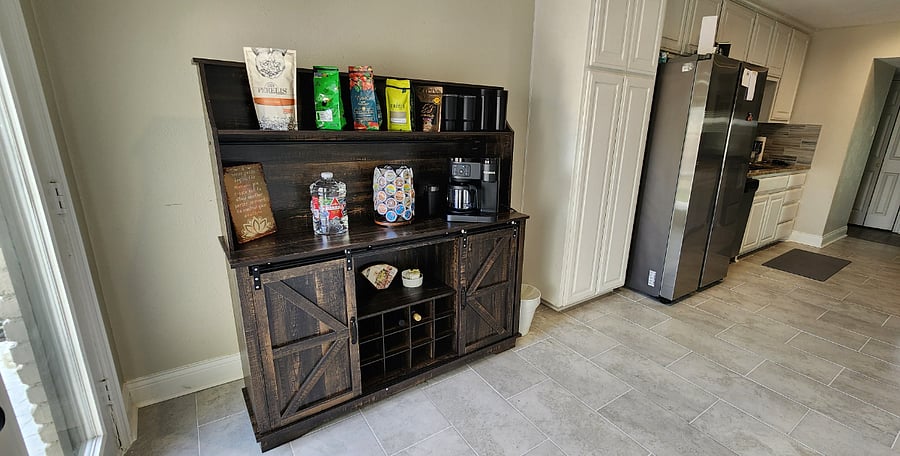 Full service coffee bar, tea, and wine. Located right next to the garage so you can grab your coffee and go. Coffee is
all imported besides the Kruieg stuff.