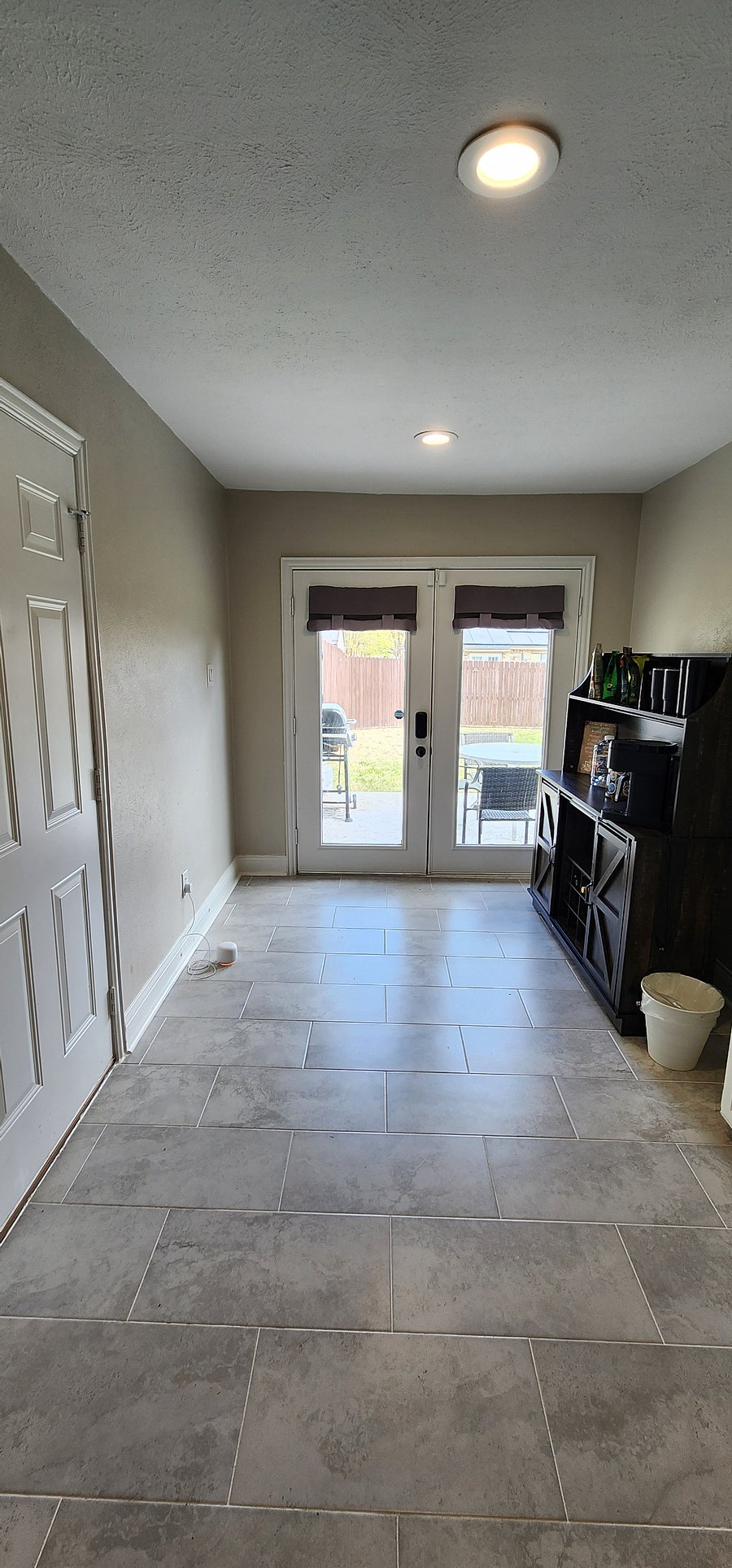 View from the kitchen of the coffee bar and and interior garage door.