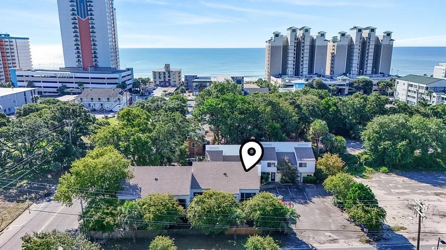 Property located (1) block from Beach