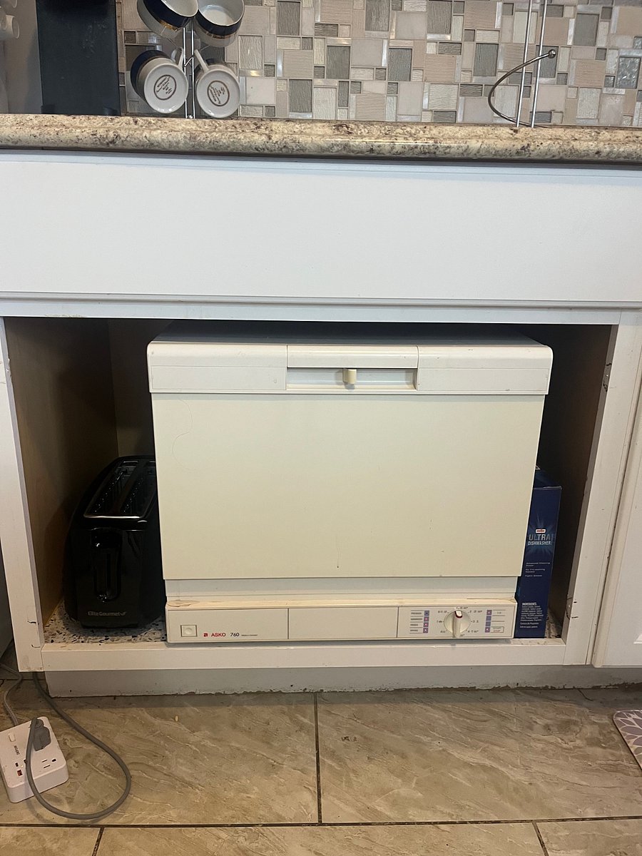 Dishwasher. This tiny dishwasher is a big convenience. Large enough for 1-2 people.  Small enough to tuck under the counter. Run daily.