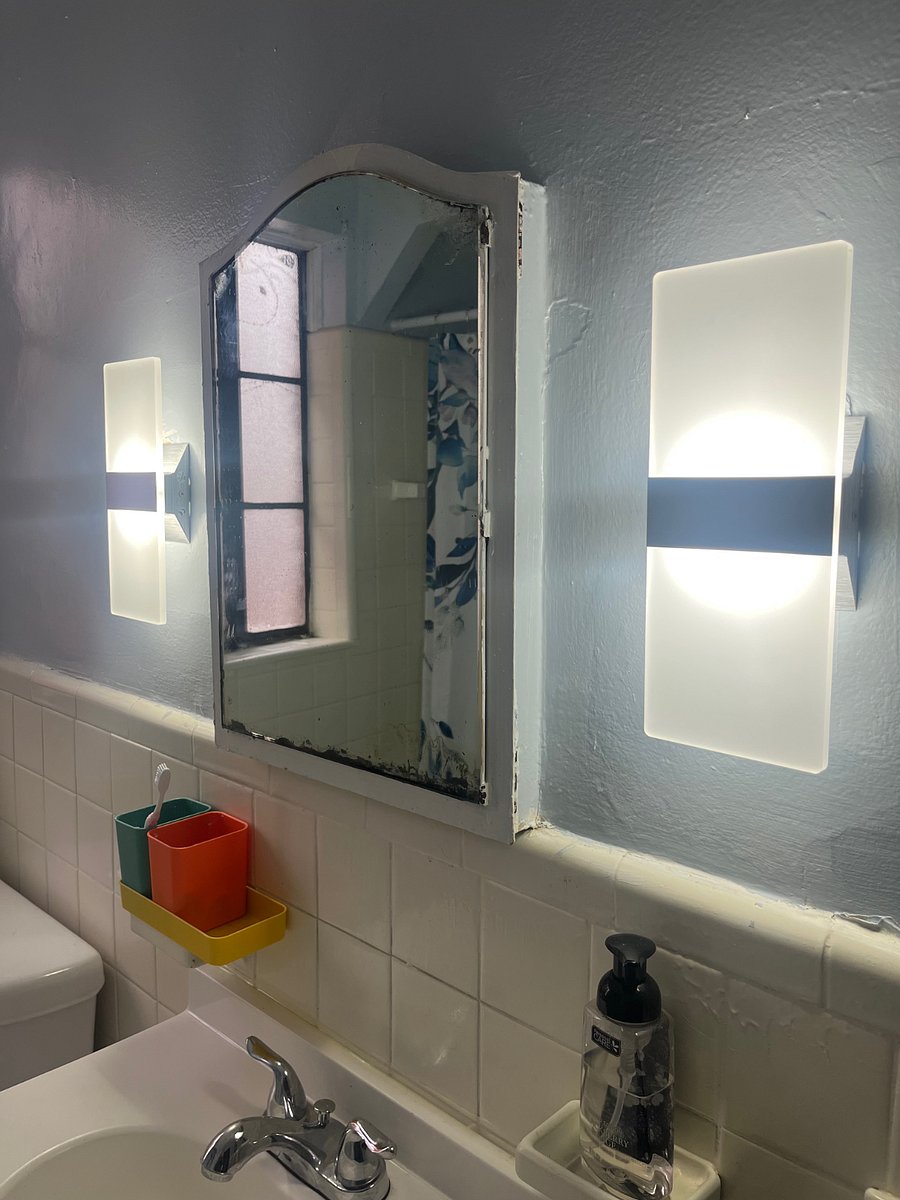 Vintage vanity.  Hall closet stores all of the linens and extras. 