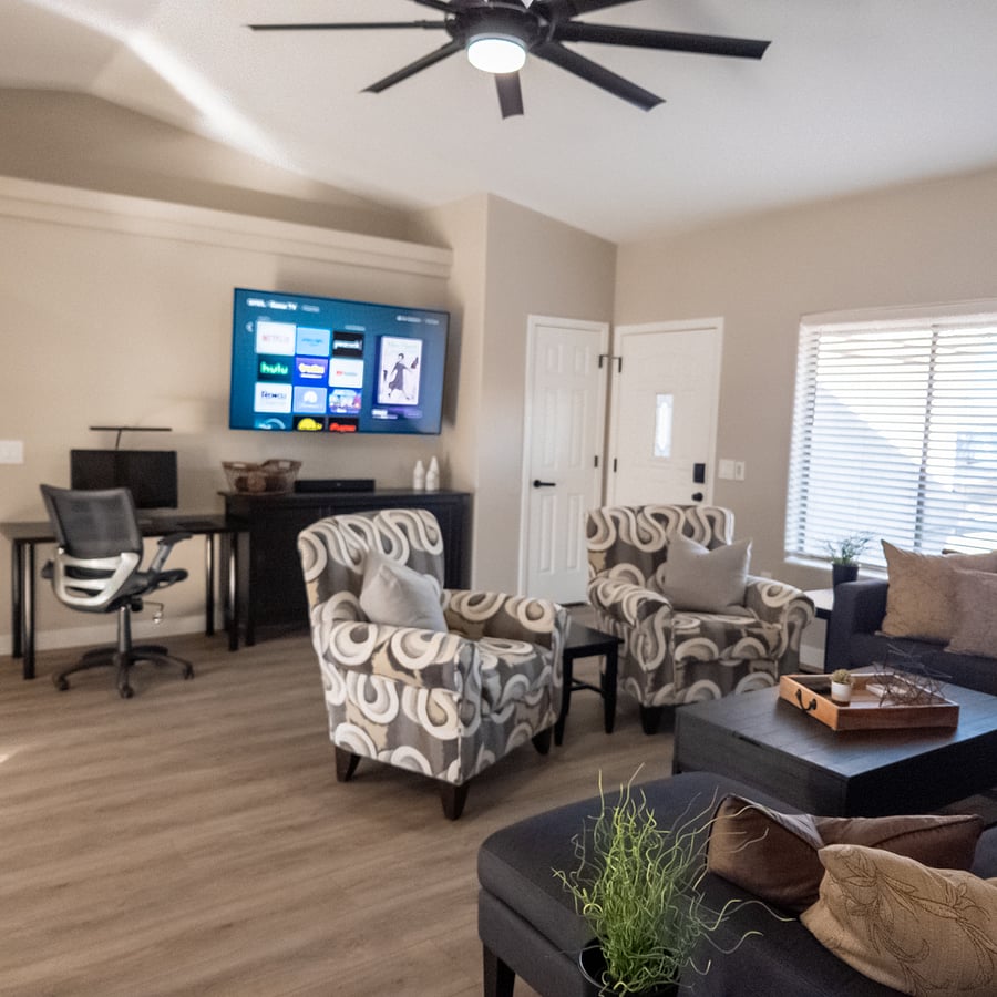 Comfortable Seating, with 65" Smart TV and Bose Soundbar and indirect lighting to set the mood.