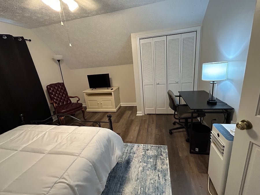 Bedroom #3 includes a desk and Smart TV (the one shown has been replaced with a larger TV.)