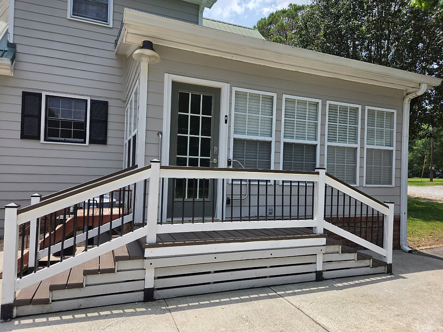 COMMON AREA: Rear entrance and exterior view of the breakfast room.
