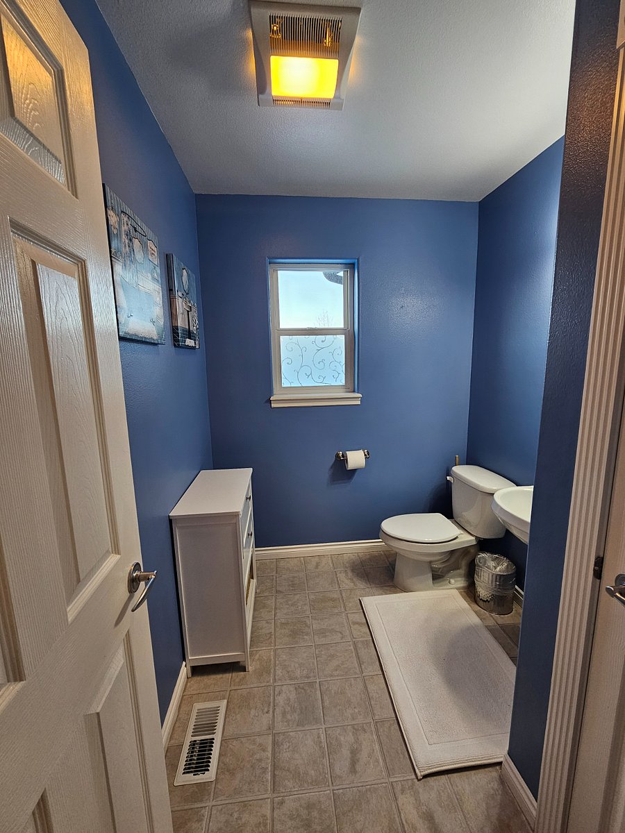 Half bathroom off living room upstairs