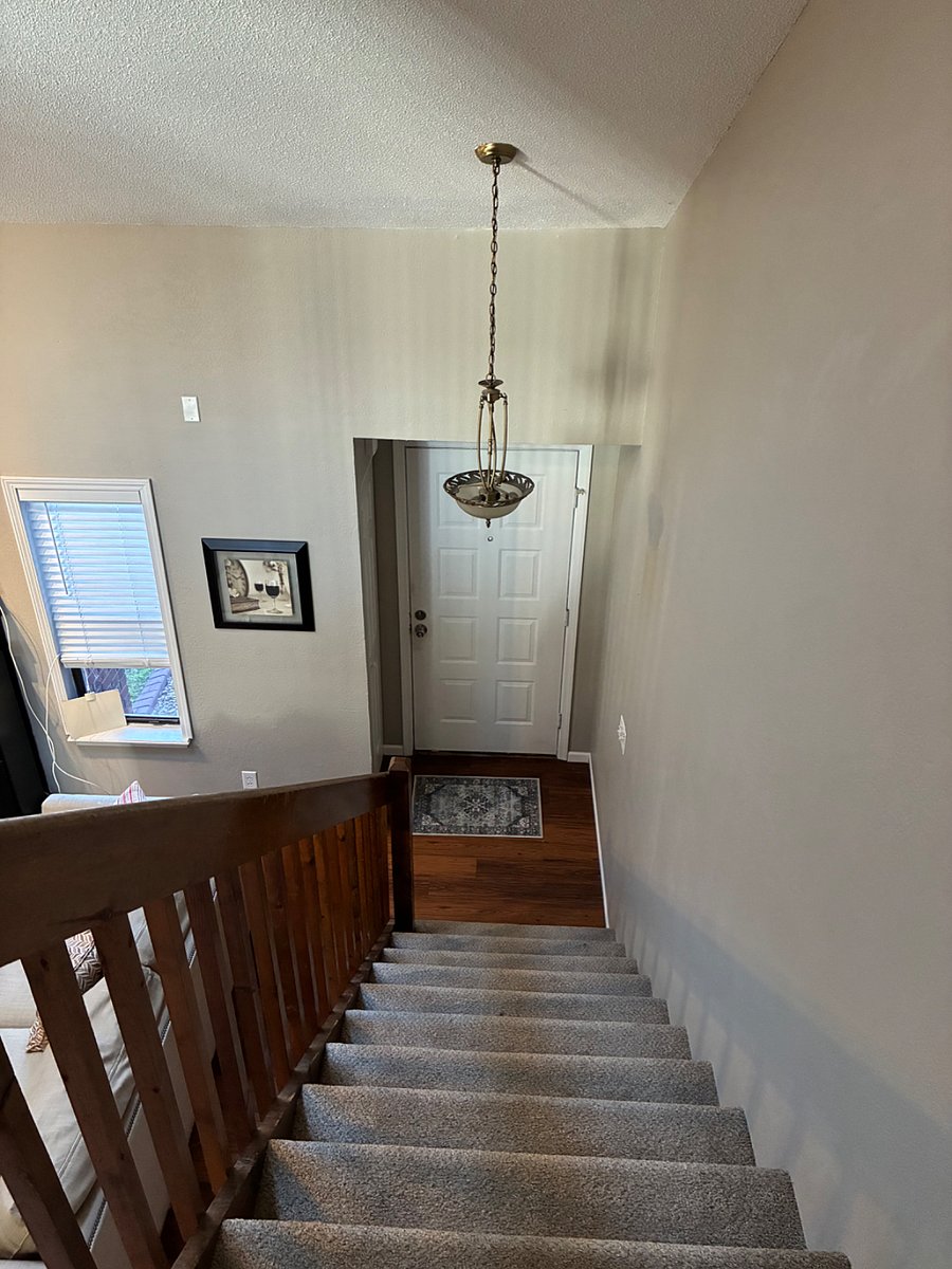 Stairs from your balcony to front door.