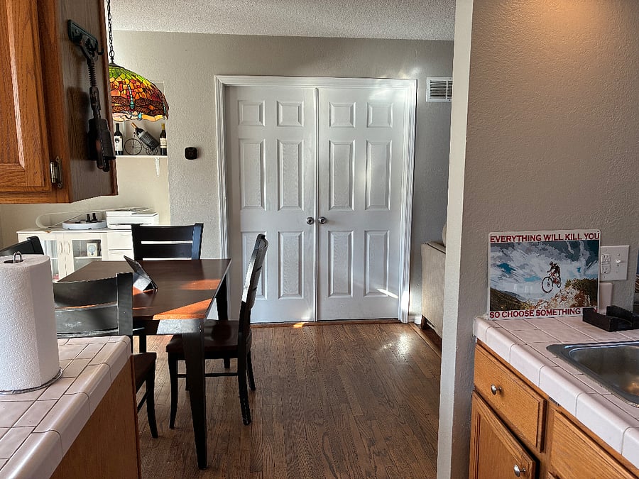 View from kitchen to my bedroom doors.