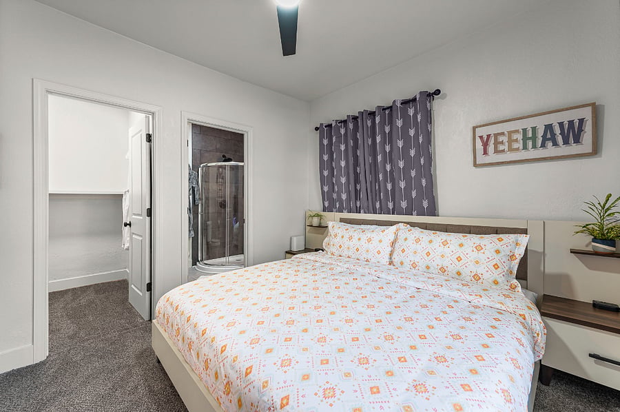 Retreat to your master haven with a plush king bed, Alexa smart device, spa-style en-suite, and walk-in closet with robes. Thoughtful touches and a hint of playful charm make this space perfect for slow mornings, restful nights, and true relaxation.