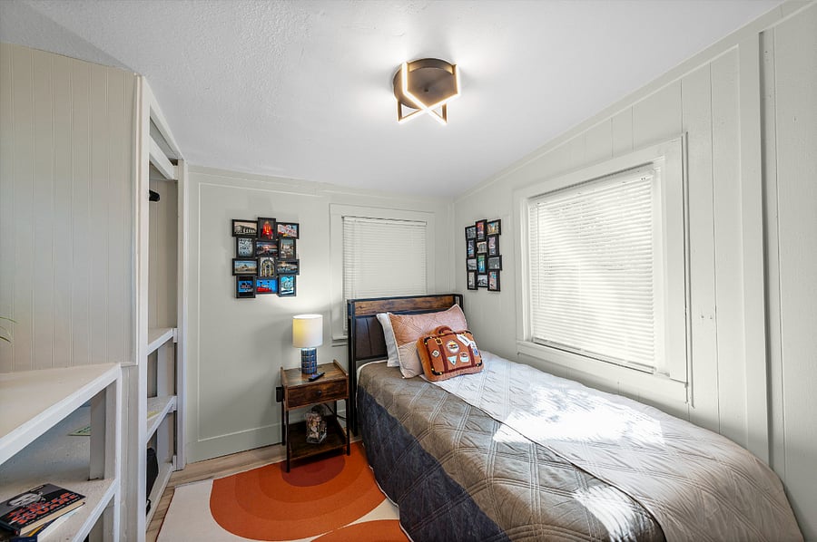 Bright and welcoming, this cozy twin bedroom is filled with natural light and thoughtful touches. Complete with a nightstand, storage, and soft bedding, its the perfect retreat for kids, friends, or solo travelers looking for comfort.