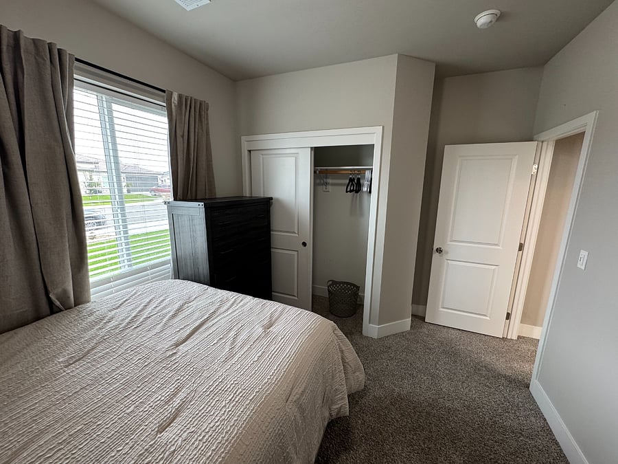 Room A with queen bed and shared bathroom