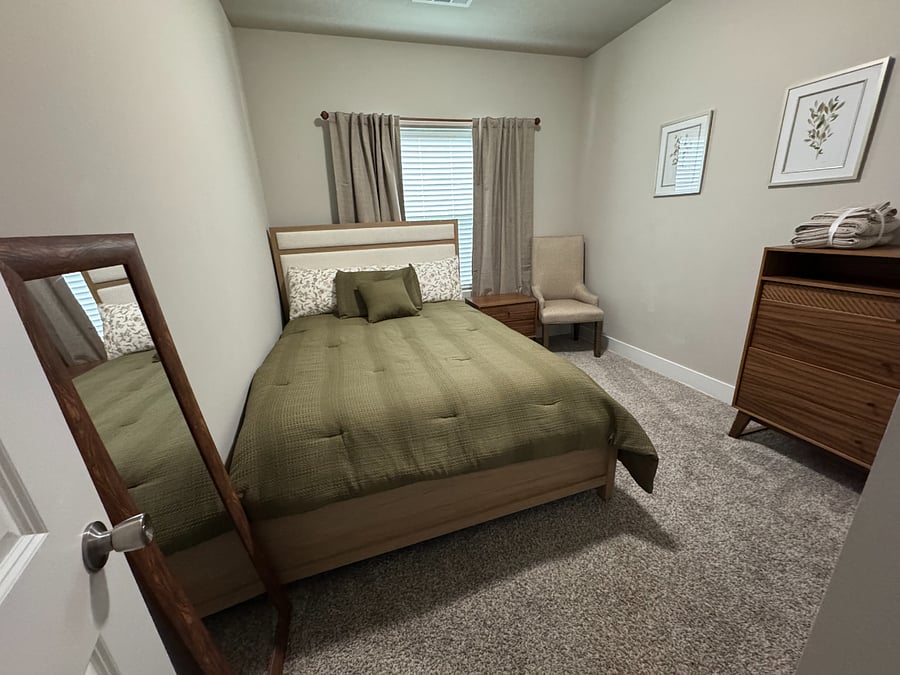 Room C with queen bed and shared bathroom
