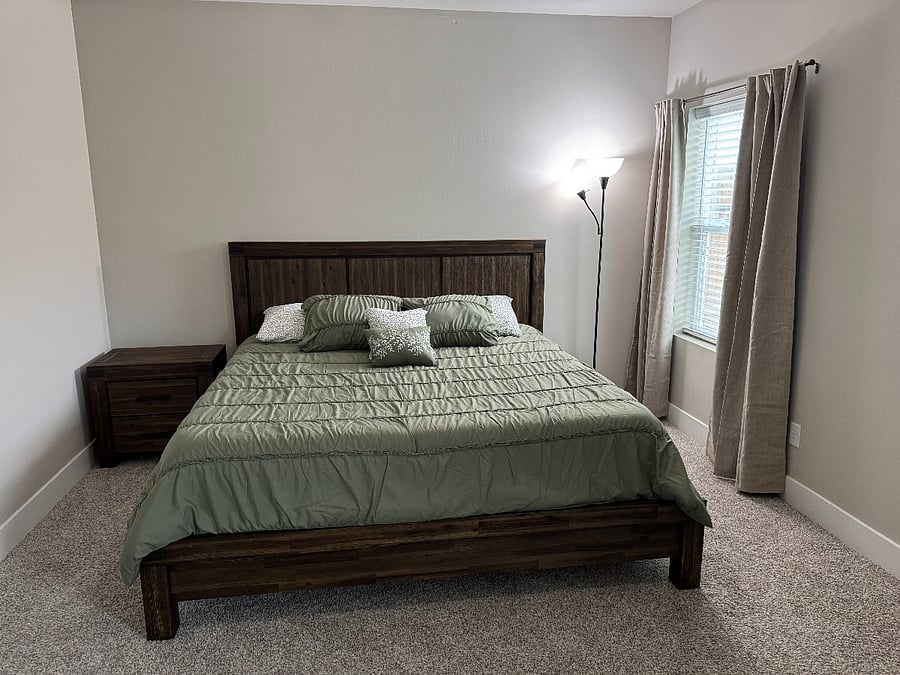 Master bedroom with king-size memory foam bed and private bathroom