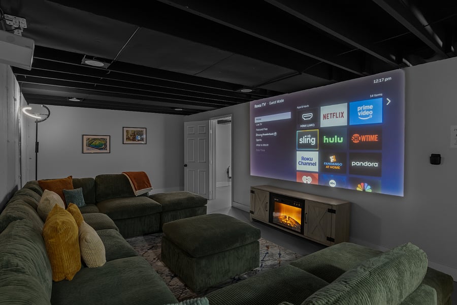Second living space area with projector Roku for streaming