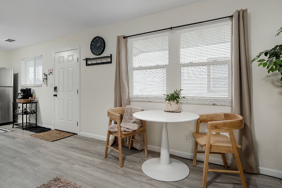 Cozy dining nook with natural light - perfect for morning coffee or remote work.