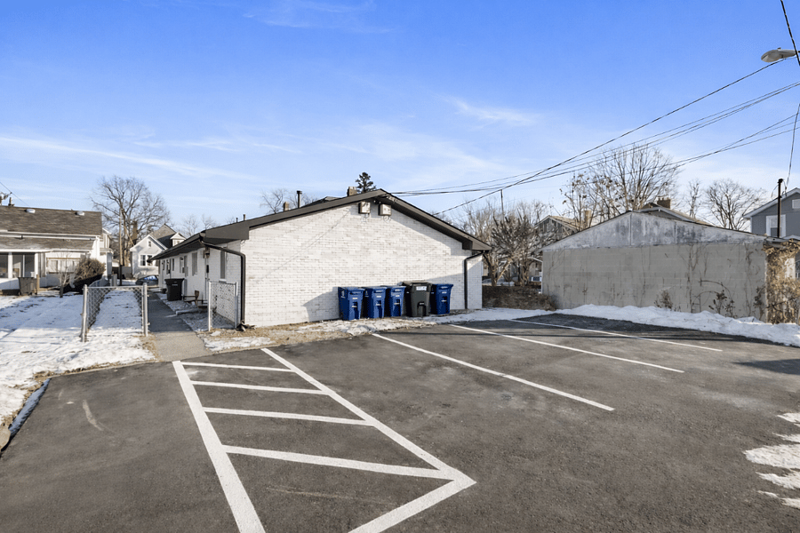 Private parking pad behind the building with easy access to your unit.