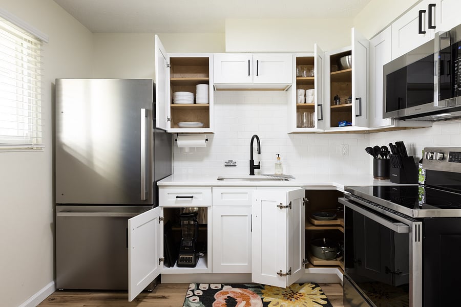 Full-size appliances and shelving for easy access.