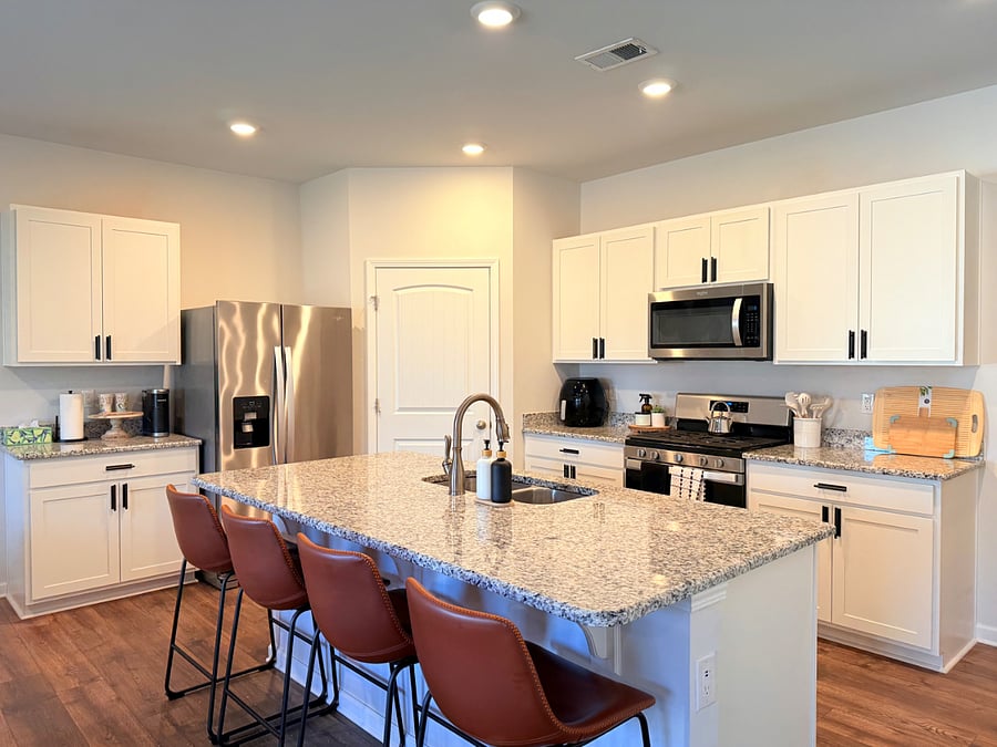 Kitchen Area with Huge Island and Gas Stove