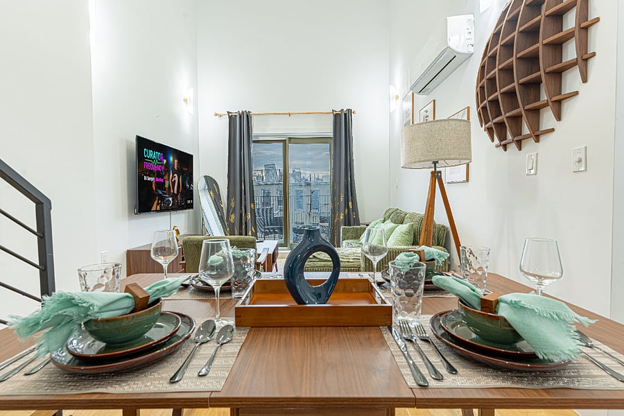 Dining table with city viewsnatural light throughout the day.