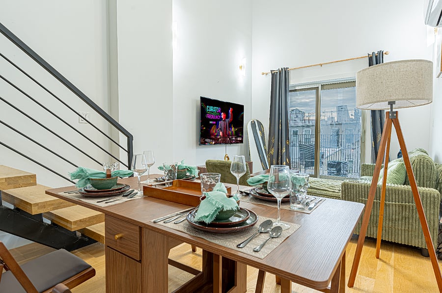 Dining table with city viewsnatural light throughout the day.