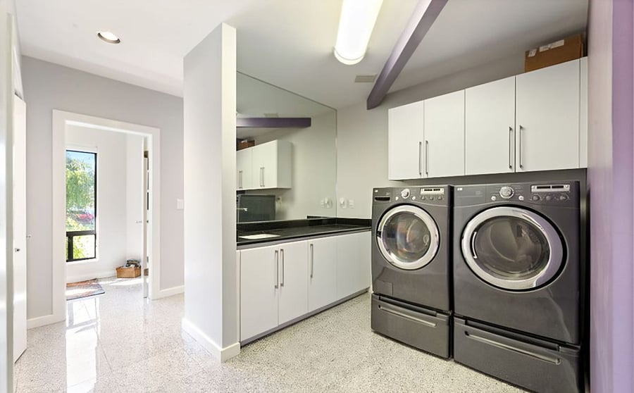 Laundry with main floor bathroom in the background