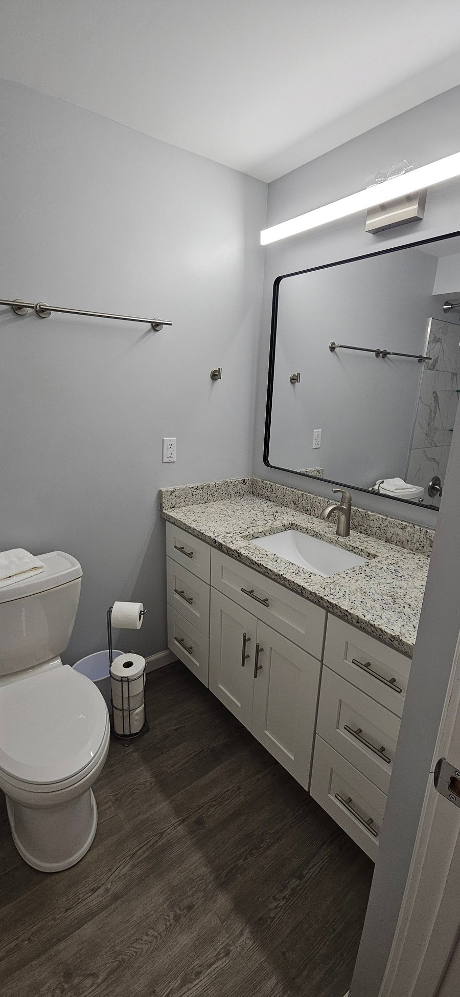 downstairs bathroom with granite countertop