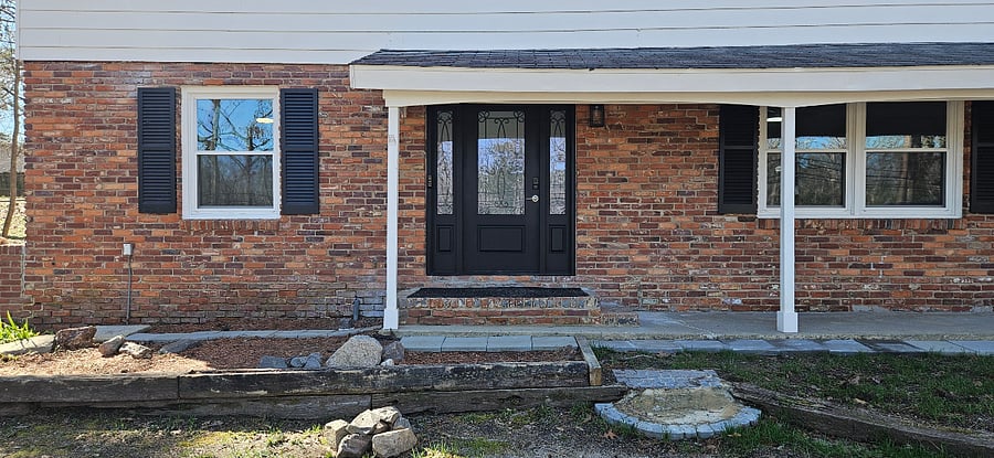 The front door reflects the house's curb appeal and welcomes visitors.