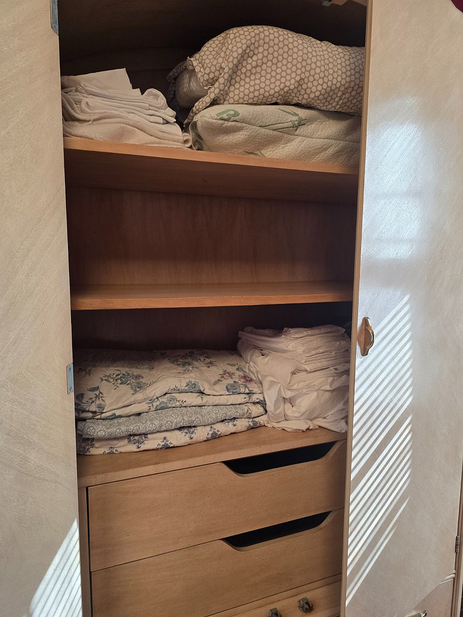 Master bedroom - extra blankets, sheets, and pillows