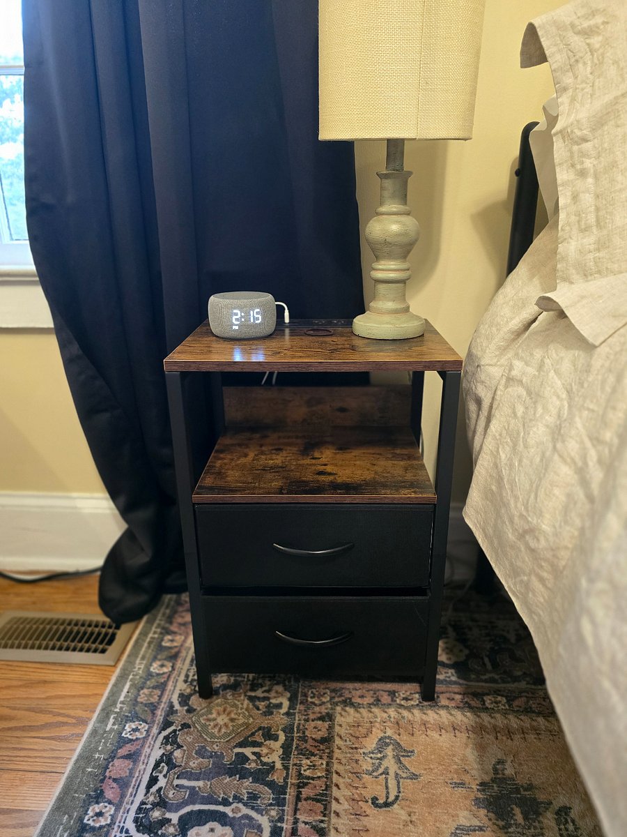 2nd bedroom - nightstand with charging station, USB port and outlets, storage shelf. Table lamp with with USB A and C ports and outlet. With noise machine and alarm clock