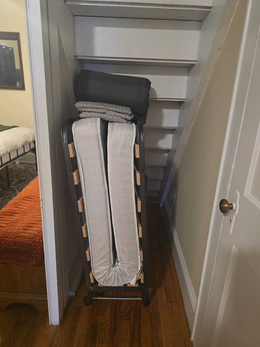 2nd bedroom - extra single, roll out bed with bed sheets and comforter