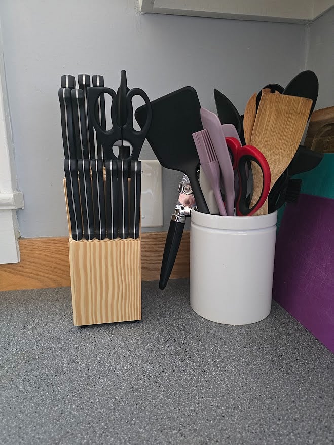 Kitchen - drying mat, various cutting boards, kitchen utensils, and steak knife set
