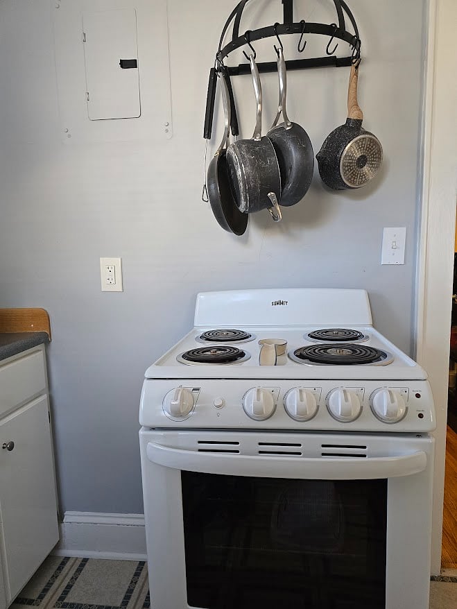 Kitchen - pots and pans with electric range oven