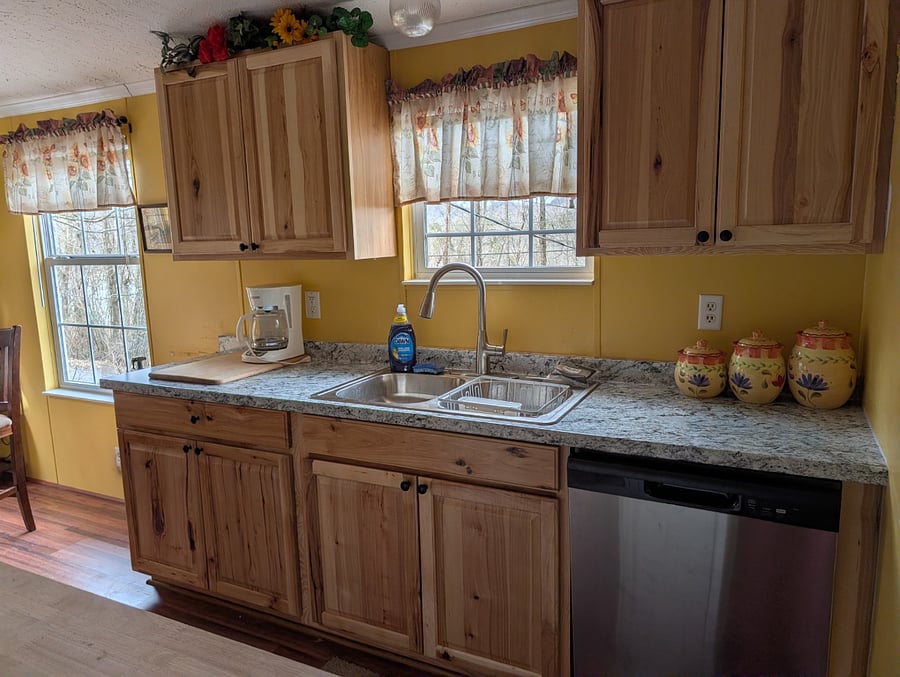 brand new cupboards and countertop, new dishwasher