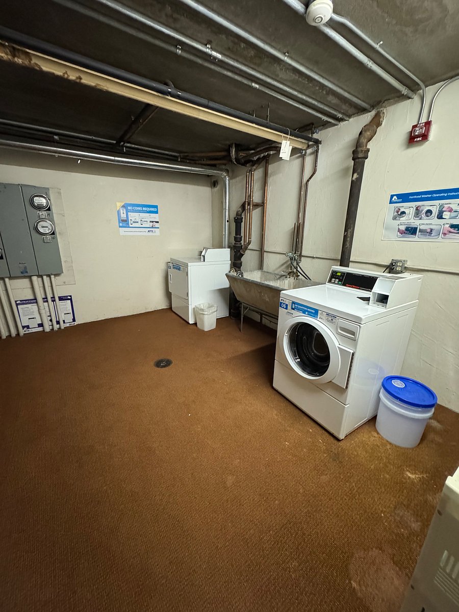 Conveniently located downstairs, right off the entrance to the garage.