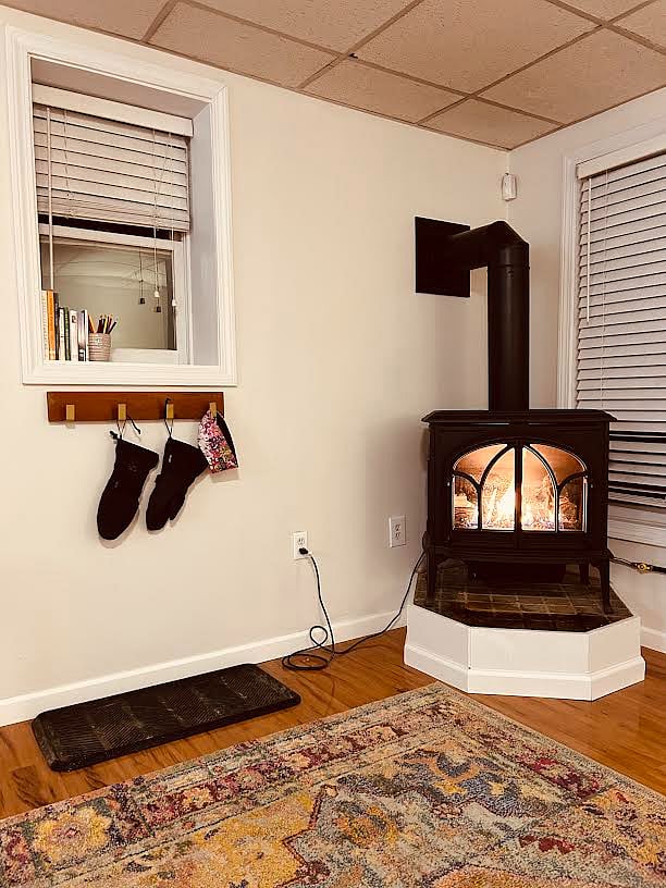 Curl up next to this cozy Jotul gas stove on those chilly evenings.