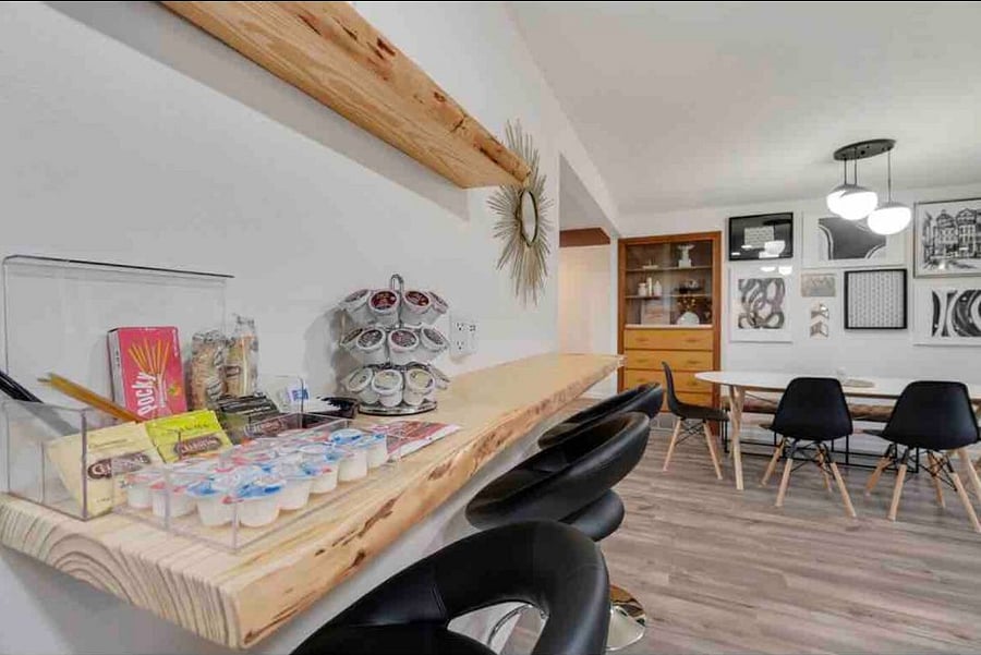 Extra bar top seating at coffee station. Single serving Keurig and pot coffee maker available. Dishwasher, garbage disposal.
