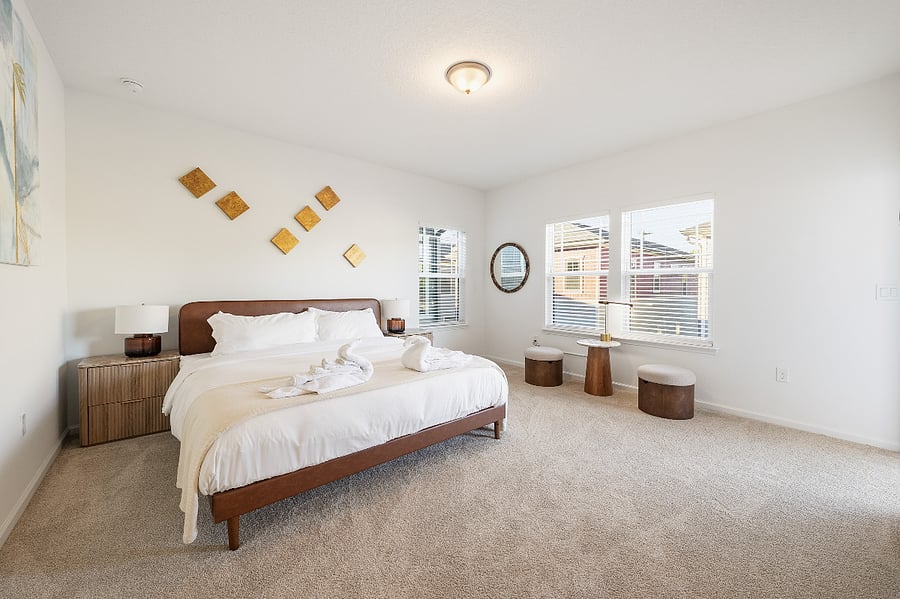 Master Bedroom with sitting area and 55" Smart TV