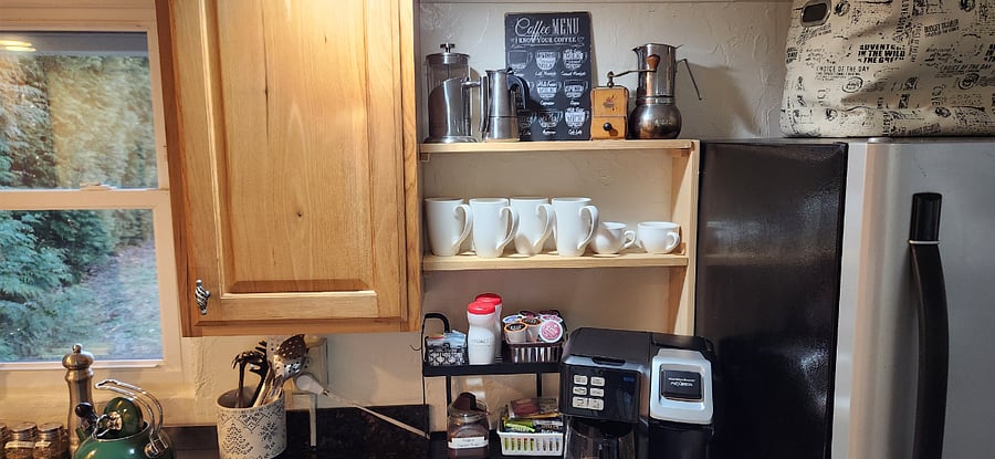 Enjoy our Coffee/Tea Bar. There is a French Press and two Stove Top Espresso Makers along with the Dual Coffee Maker for a full pot or Keurig Maker. Starter Set Up of Coffee Pods, Ground Coffee, Several Tea Blends, Creamer and Sugars