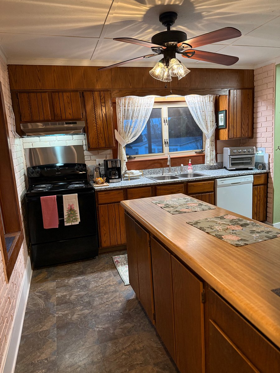 Full kitchen with like new stove/oven.