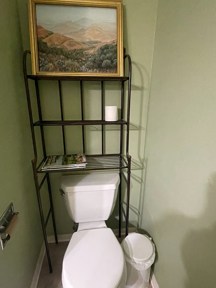 Tucked away comode.