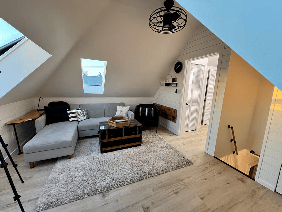 Attic Living Room. Couch turns into bed.