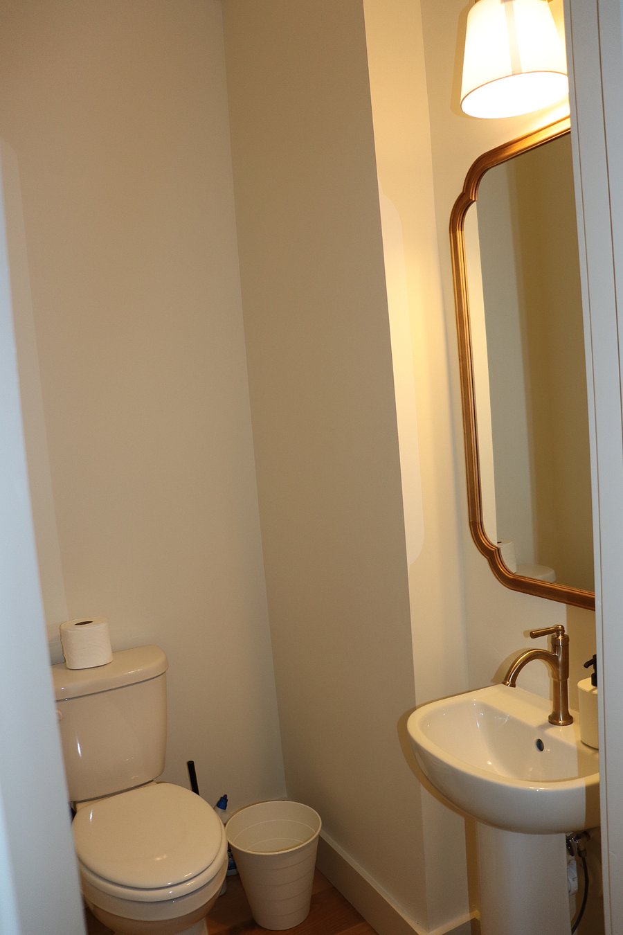 Downstairs mudroom/shared entry half bath. 