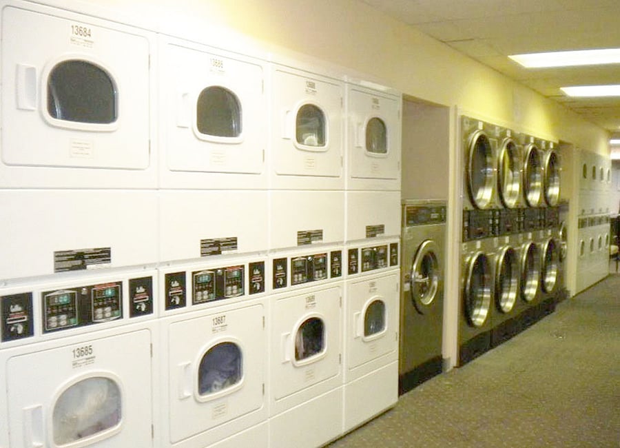 Laundry Room. Uses a laundry card that you re-load using a credit card in the machine provided in the laundry room.