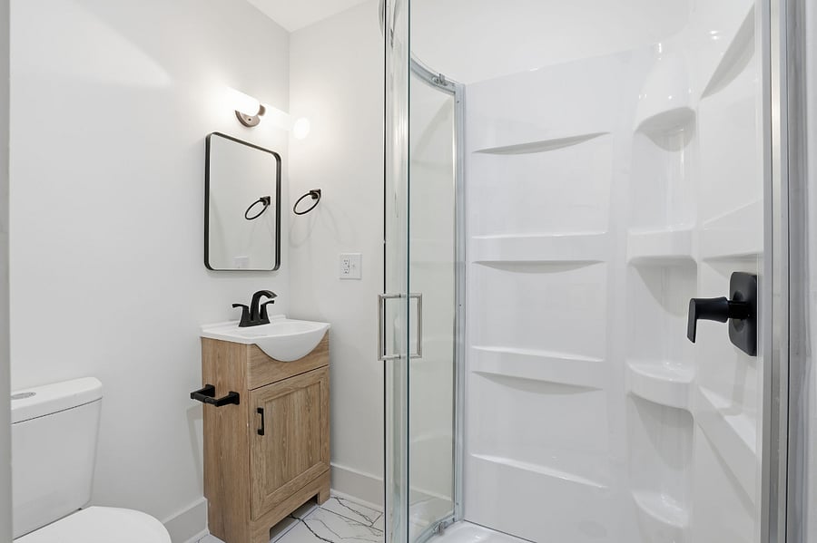 Studio bathroom with full shower
