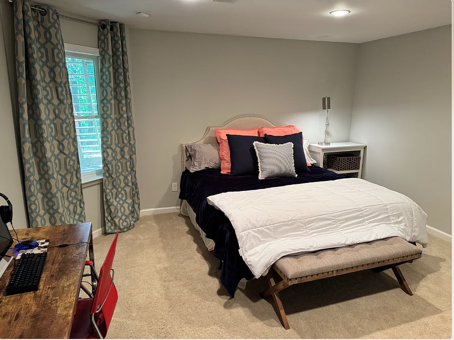 Large Master Bedroom with king sized bed and room darkening curtains