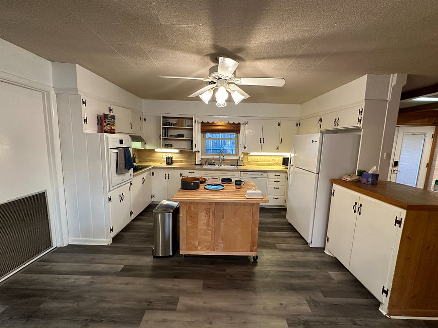 Spacious kitchen with butcher block island